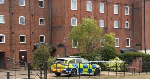 Man found dead after police called to block of flats