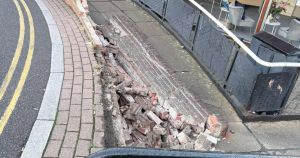 People warned to 'be careful' after large chunk of wall in town knocked down