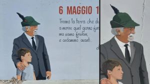 Murale per i 50 anni del terremoto, è scontro: «Penna alpina dalla parte sbagliata e campanile di un altro paese»