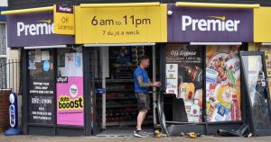 Photos show smashed up corner shop after crash
