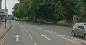 Mystery over injured man found lying in busy road near town centre