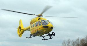 Woman in her 60s taken to hospital by air ambulance after accident