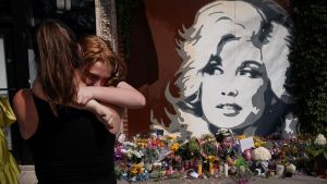 Dolly Parton, Gloria Steinem, and Why Grieving a Celebrity Feels So Personal