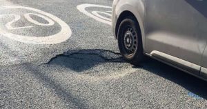 Collapsing sinkhole forces road near primary school to close