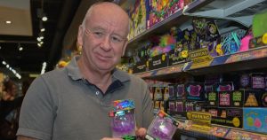 Shoppers queue out the door at Langleys to get their hands on latest toy craze