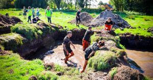 Hundreds tackle muddy obstacles to support East Anglian Air Ambulance
