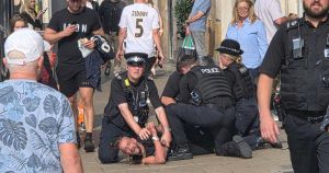 Dramatic scenes as man screams while being pinned to pavement in city centre arrest