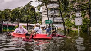 Bangkok floods: Thousands evacuated as heavy rain leaves homes, roads submerged
