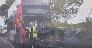 Ten treated after bus and car crash closes road for several hours