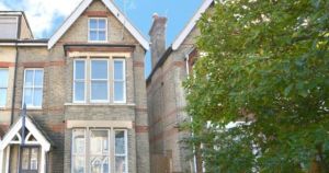 Victorian terrace converted into three flats up at auction
