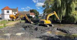 Work begins to restore village's dirty duck pond