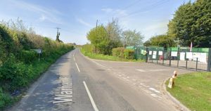 Car in plumes of smoke after crash outside recycling centre