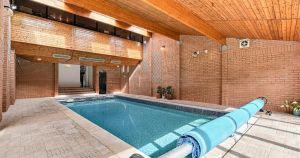 Five-bedroom home with indoor swimming pool and games room hits the market
