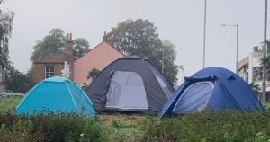 Tent city grows as another appears in middle of busy roundabout