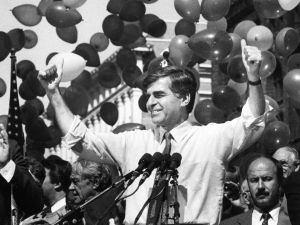 John Williams wrote a fanfare for Mike Dukakis. I had to hear it.