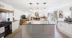 Three-bedroom Weeting cottage with entertaining lodge for sale at £575,000
