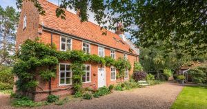 Restored 16th-century farmhouse with extensive grounds for sale at £1m-£1.1m